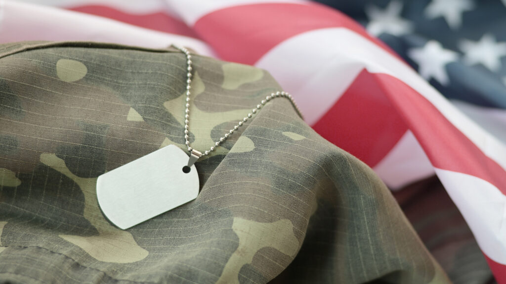 American Flag and Military Uniform with Dog Tag
